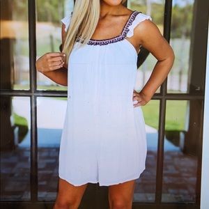 These Three boutique white romper